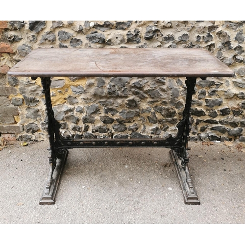 165 - A Victorian cast iron rectangular pub table, with a mahogany top, over a black painted pedestal base... 