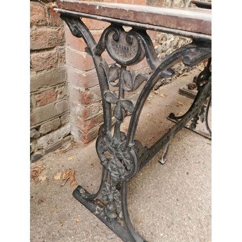 166 - A Victorian cast iron rectangular pub table, with twin-pierced three-leaf clover and floral decorate... 