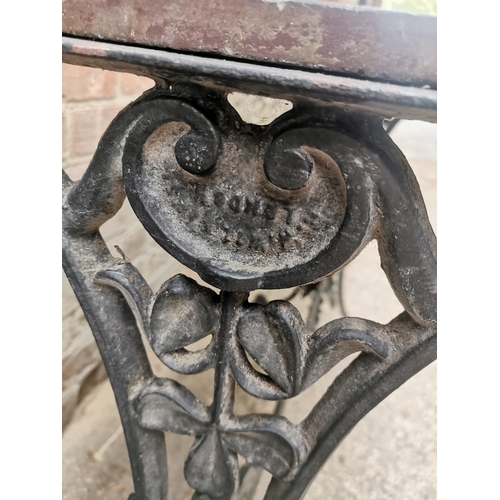 166 - A Victorian cast iron rectangular pub table, with twin-pierced three-leaf clover and floral decorate... 