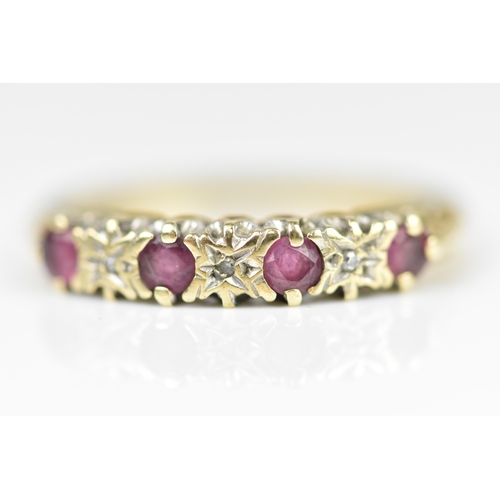 127 - A small group of dress rings, to include a 9ct yellow gold, garnet and white opal five stone ring, a... 