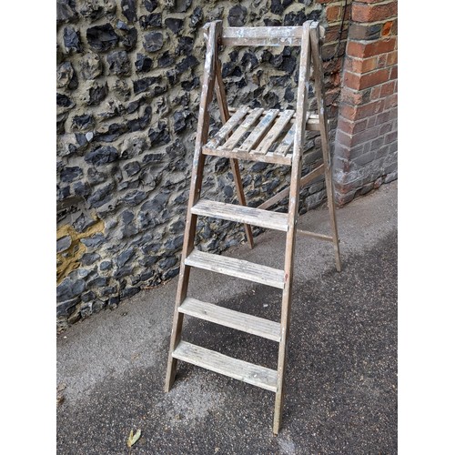 250 - A vintage beech folding step ladder with reeded treads, 130cm h
Location: RWF