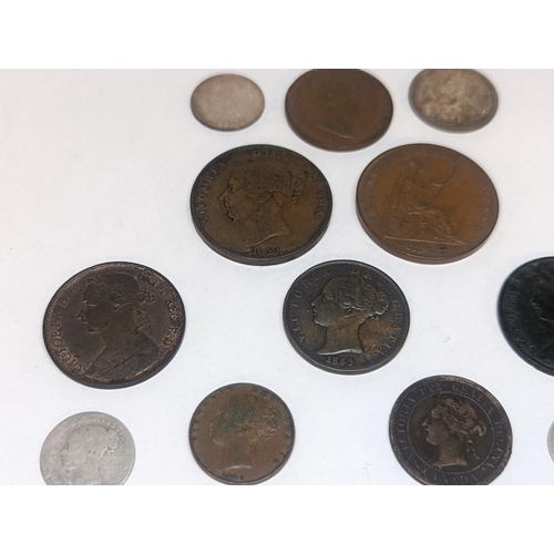 107 - A group of mostly Victorian British coinage to include 1857 and 1879 pennies, 1887 shilling and sixp... 