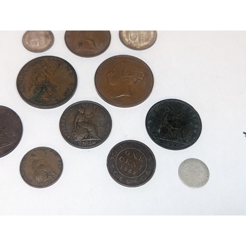 107 - A group of mostly Victorian British coinage to include 1857 and 1879 pennies, 1887 shilling and sixp... 