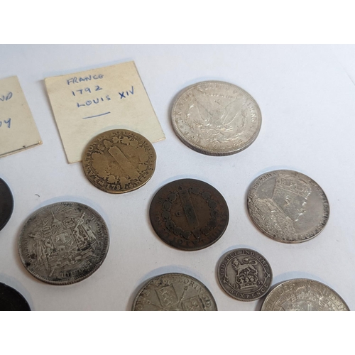 110 - A group of British and foreign late 19th/early 20th century coinage to include half crown, florin, s... 