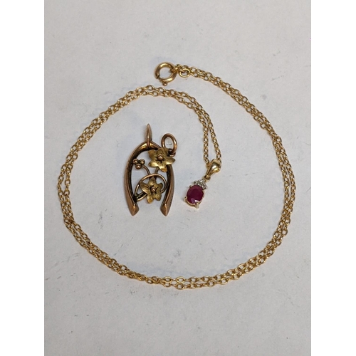 117 - A 9ct gold pendant, together with a 9ct gold necklace and pendant inset with a ruby and diamonds, 3g... 