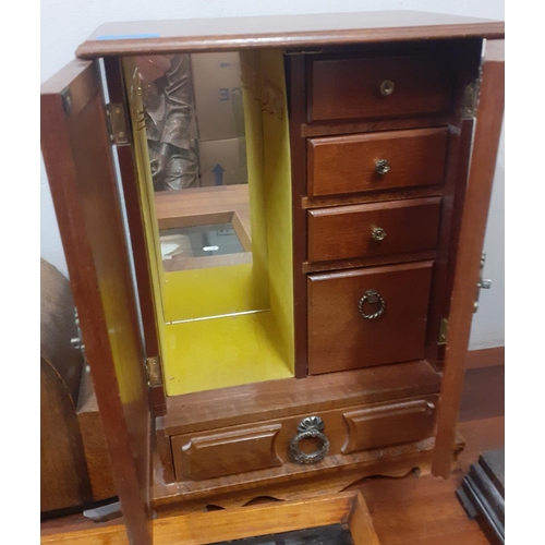 131 - Two mid 20th century oak cased mantel clocks to include a Westminster Chime together with a mid 20th... 