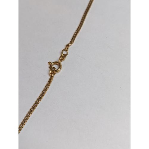 138 - A stamped 750, 18ct gold link necklace having a 9ct gold pendant inset with a seed pearl and a pair ... 