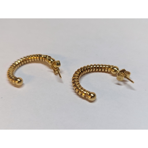 142 - A pair of stamped 750, 18ct gold sprint effect earrings, 3.4g
Location: CAB5