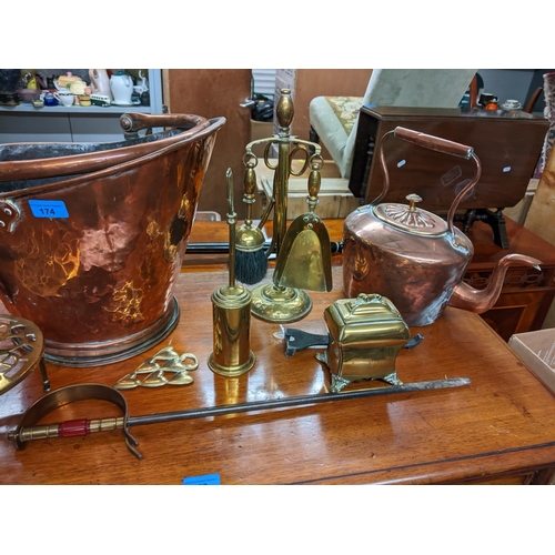 174 - A selection of Victorian and later copper and brassware to include a copper coal bucket, coffee pot ... 