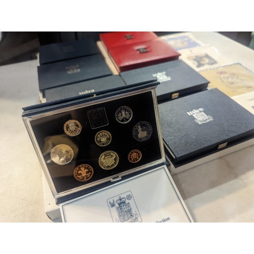 177 - A group of twelve UK uncirculated coin sets to include UK proof coin collection 1986-87, 1989-1991 a... 