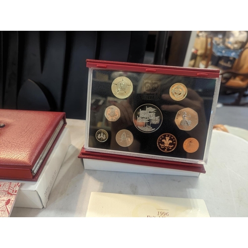 182 - A group of nine UK uncirculated coins sets to include UK proof coins collection 1992, 1994-97, along... 