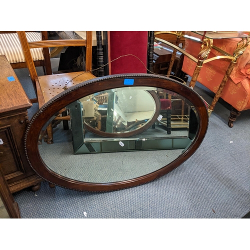 185 - Mixed furniture to include a display table, an oval mirror and a small display cabinet with glass sh... 