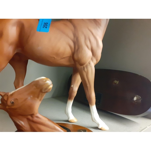 206 - Late 20th century bisque models of race horses to include a Beswick The Minstrel racing horse of the... 