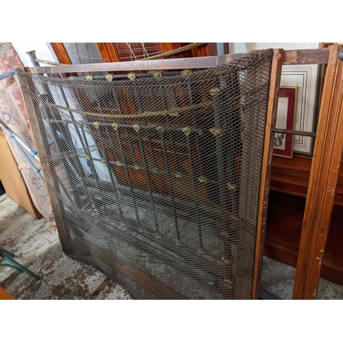 229 - A late 19th/early 20th century iron and brass bound bedframe
Location: G