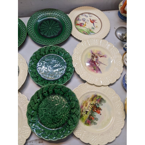 25 - Four Victorian Majolica plates to include a pair of Minton lattice plates, together with four Coalpo... 