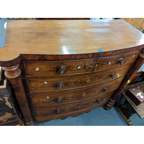 257 - A Victorian mahogany bow fronted chest flanked by Pillars, turned handles and shaped apron, 128h x 1... 