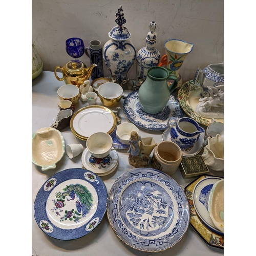 28 - A mixed lot to include Delft, hock glass, carnival ware bowl, Belleek, pot lid and other items
Locat... 