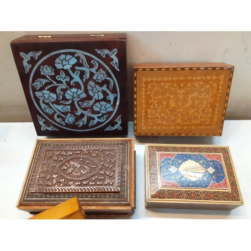 296 - A quantity of 20th century decorative treen boxes to include a Sorrento inlaid music box, together w... 