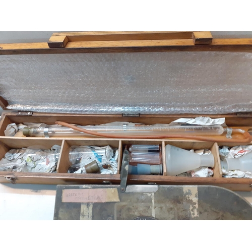 303 - A vintage Ureteric Catheter in original metal Arnold & Sons case and a wooden box containing a scien... 