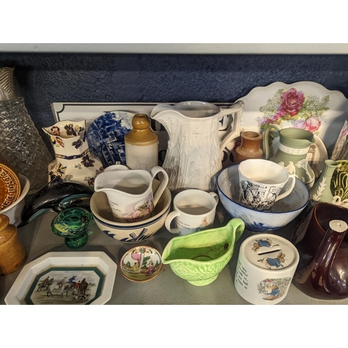 304 - A mixed lot of ceramics and other items to include Beatrix Potter Wedgwood items, Spode, glass paper... 