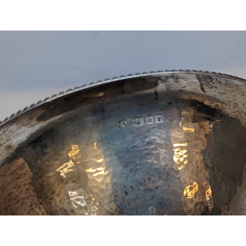 48 - A George V D & J Wellby silver footed bowl having hammered decoration, 285g, Location: 7.1