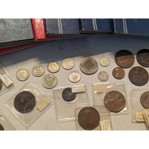 56 - Mixed British coinage to include 'Whitman' coin folders of pennies, half pennies, brass threepence a... 