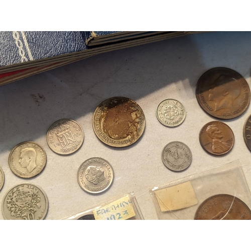 56 - Mixed British coinage to include 'Whitman' coin folders of pennies, half pennies, brass threepence a... 