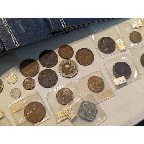 56 - Mixed British coinage to include 'Whitman' coin folders of pennies, half pennies, brass threepence a... 