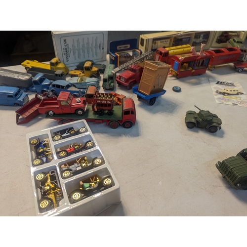 59 - A group of vintage toy cars to include Dinky military vehicles, Corgi Chipperfields Circus vehicles ... 