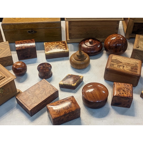 60 - A group of treen items to include wooden jewellery trinket an other boxes in various shapes and size... 