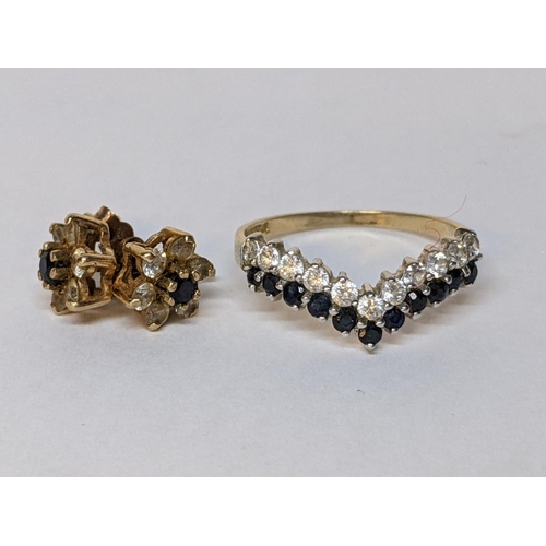 64 - A 9ct gold sapphire and white stone set ring, together with a pair of matching earrings, 2.7g
Locati... 