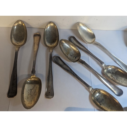 82 - A group of eleven mixed silver Danish tablespoons, having various monograms and some stamped, Prahl,... 