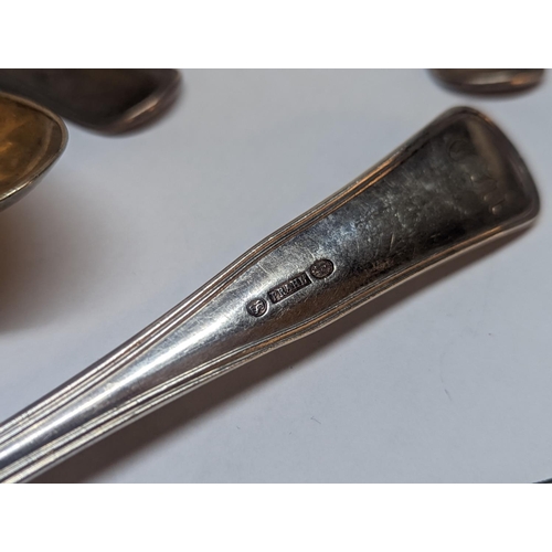 82 - A group of eleven mixed silver Danish tablespoons, having various monograms and some stamped, Prahl,... 