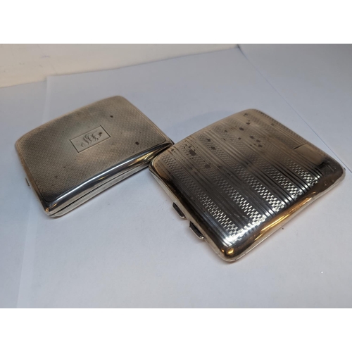 85 - Two silver cigarette cases with engine turned decoration, 249g
Location: CAB2