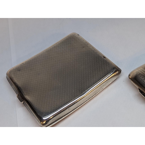 85 - Two silver cigarette cases with engine turned decoration, 249g
Location: CAB2