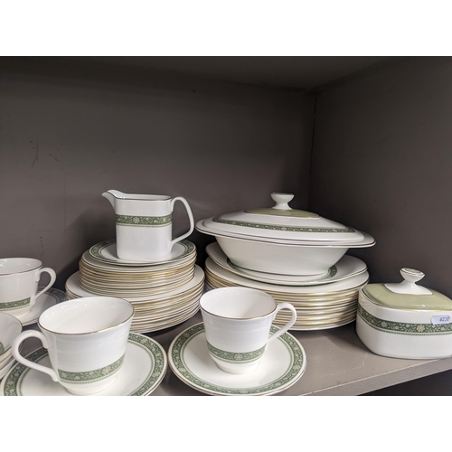 279 - A Royal Doulton Rodelay part dinner service to include dishes, pots, cups, saucers, plates and other... 