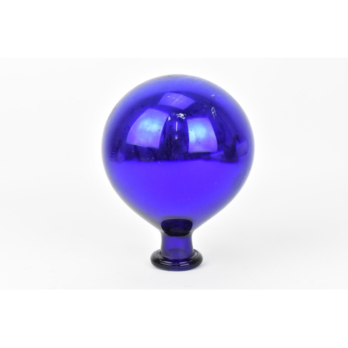 284 - A large Victorian mirrored blue glass witches ball, 11 cm diameter x 14 cm high
Location: 4.1