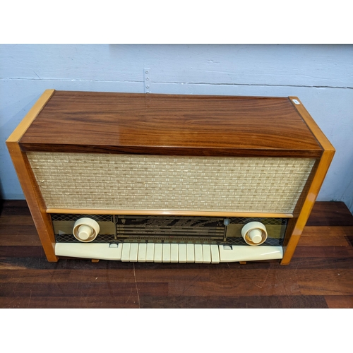 360 - A large mid 20th century walnut veneered valve radio by Orion, type AR612, along with two vintage wa... 