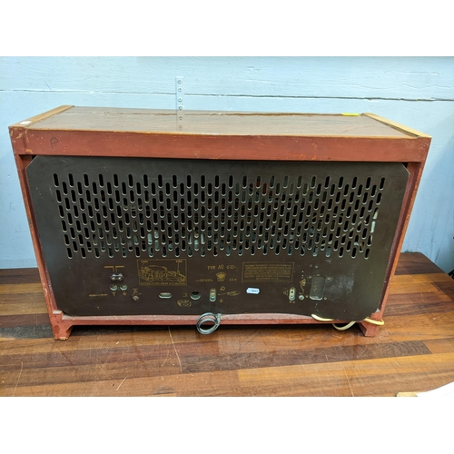 360 - A large mid 20th century walnut veneered valve radio by Orion, type AR612, along with two vintage wa... 