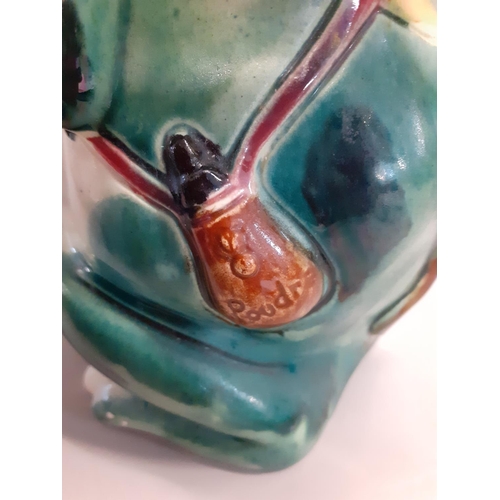 322 - A French Majolica 19th century jug in the form of a frog, together with an Amphora style vase and a ... 