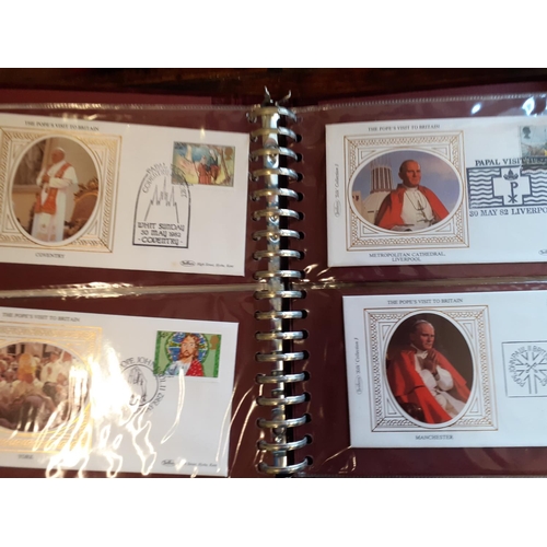 390 - A First Day Cover stamp collection comprising The Twelve Days of Christmas 1977 and five other album... 