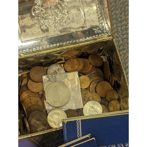 111 - A mixed lot of British and other coinage, to include 1902 and later coins folders, albums containing... 