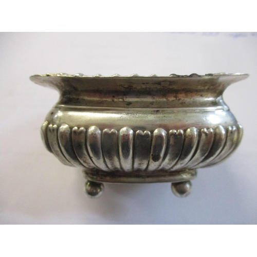 286 - A pair of Victorian silver salts with fluted top rim and lower half of body, on ball feet, Chester 1... 