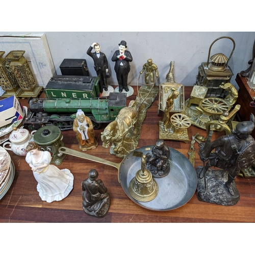 327 - Collectables to include brassware, a model train, decorative plates, a Royal Doulton figure, dolls, ... 