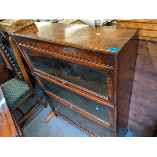 340 - An early 20th century oak Globe Wernicke style, three tier bookcase, 112h x 87w
Location: RAM