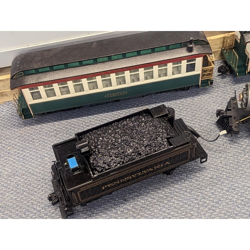 363 - A large gauge Bachmann plastic model railway to include locomotive tender, two carriages, track and ... 