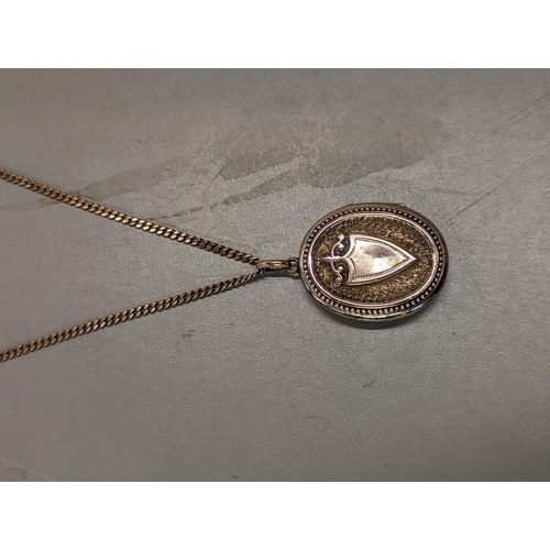 375 - THIS LOT IS WITHDRAWN: - A 9ct gold curb link necklace having a gold plated locket with floral decor... 