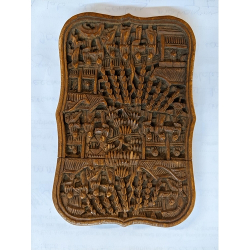 378 - A 20th century Canton carved wooden card case
Location: CAB3