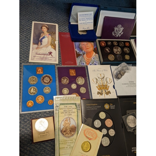 387 - A coin collection to include American silver proof sets, various mint cased sets, a Victorian shilli... 