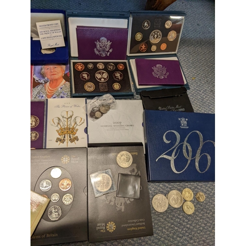 387 - A coin collection to include American silver proof sets, various mint cased sets, a Victorian shilli... 